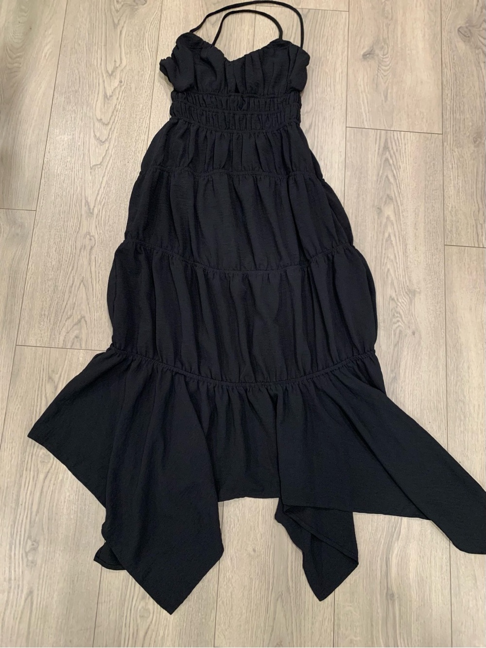 Black asymmetrical hemline